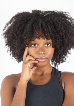 Closeup young black woman, white background