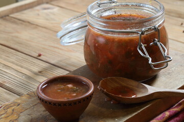 plum sauce with garlic, spices and herbs