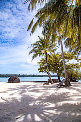 Beautiful tropical island koh Kham, white sand beach with volcanic rocks, near koh Mak, Trat, Thailand