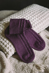 A pair of hand knitted socks.  Concept for handmade and hygge slow life.