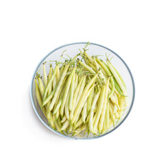 Fresh green beans in glass bowl isolated on a white background