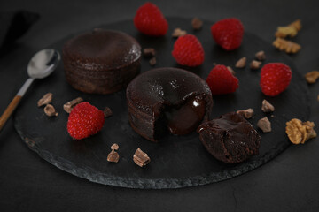 Hot chocolate coulant dessert cake on dark background