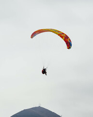Paraglider Flying in the Sky - 467005059