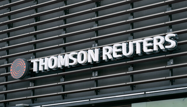 Gdansk, Poland, Europe 10.28.2021. Thomson Reuters on the facade of corporate office buildings located in Polish Gdansk headquarters. Logo of the Thomson Reuters on the office building. 