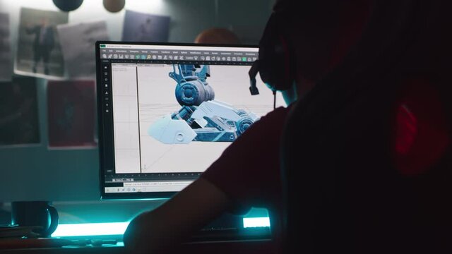 Teenager creating 3D model for videogame