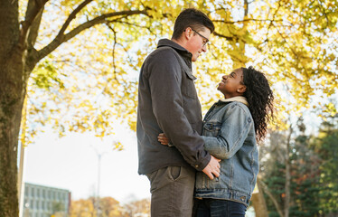 Fototapeta premium Romantic Teenage Couple In Autumn Park outside
