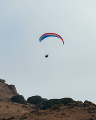 Paraglider Pilot Flying in the Sky - 467008818