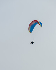 Paraglider Pilot Flying in the Sky
