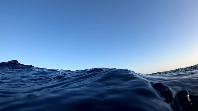 Underwater camera plunges over down into the water and into the depths of Egypt, the Red Sea. hd video