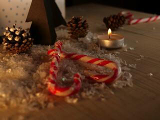 Candy cane in a love heart in Christmas scene 