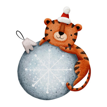 Cute tiger lying on a christmas ball. Symbol of 2022.