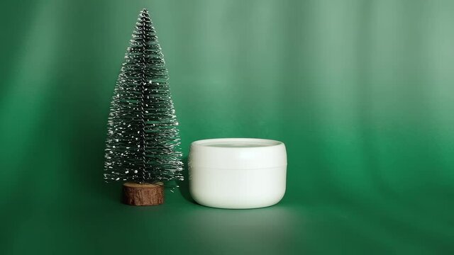 Tree and mock-up of a white jar of cream on a green background in the rays of the sun. Concept of skincare cosmetic, spa and wellness center, facial treatment.