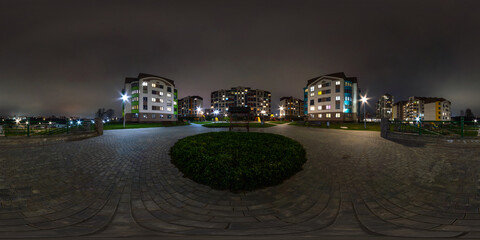 night 360 hdri panorama near playground in middle of modern multi-storey multi-apartment...
