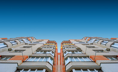 Photo of red white modern apartment building