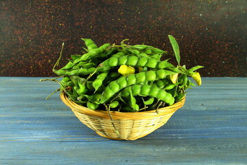 fresh pigeon pea or tuvar beans in basket 