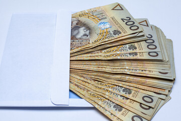 polskie banknoty w opakowaniu kopertowym