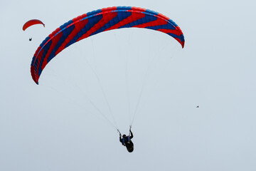 Paraglider Pilot Flying - 467016654