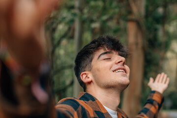 teen boy relaxed outdoors breathing