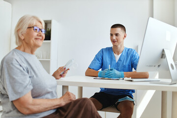 the patient sits in the doctor's office a visit to the hospital