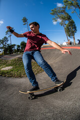 Skateboarder practice on a pump track park