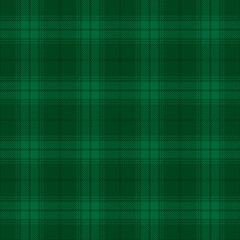 Green tartan plaid. Scottish pattern fabric swatch close-up. 
