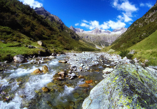 Alpine river in a mountain valley, Gorezmettlen, Wassen, Switzerland