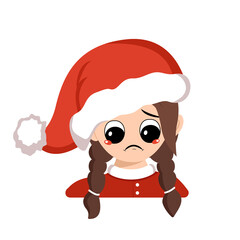 Girl with big eyes and sad emotions, depressed face, down eyes in red Santa hat. Cute child with melancholy expression in carnival costume for holiday, New Year and Christmas. Head of adorable kid