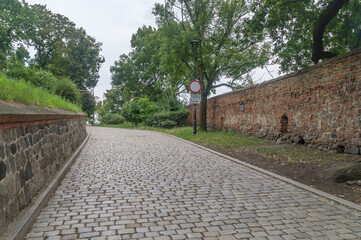 Cobblestone road to the castle hill in Grudziadz, Poland.