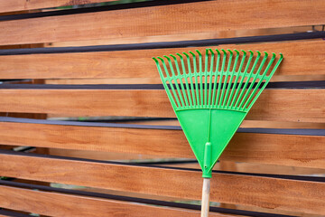 broom on a wooden background