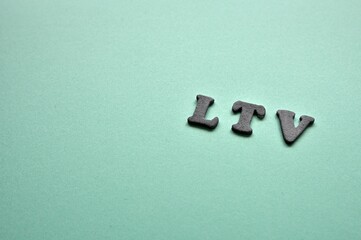The letters arranged in the word LTV It's an abbreviation for Life Time Value. Copy space available.