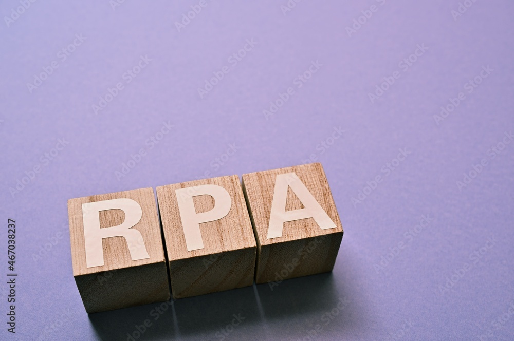 Aufkleber the word cubes formed rpa it's an abbreviation for robotic process automation. copy space available.