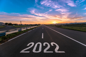2022 text on asphalt road