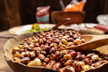 Toasted Andean corn with salt served on a rustic bowl.