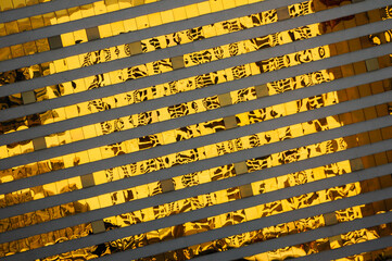 Diagonal lines from a golden shiny facade from a hotel in Las Vegas, Nevada