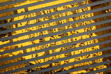 Muurstickers Diagonal lines from a golden shiny facade from a hotel in Las Vegas, Nevada © Marquicio