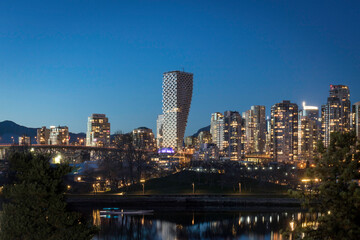 Fototapeta na wymiar Vancouver House and downtown at blue hour