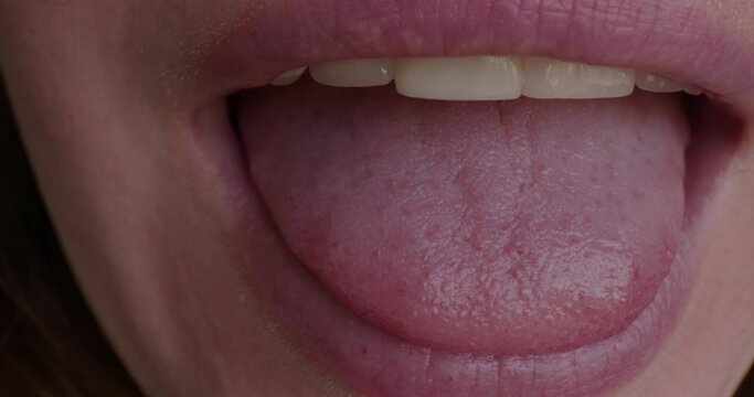 Close Up of a Woman's Mouth and Tongue