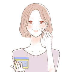 ワセリンを顔に塗って保湿する中年女性