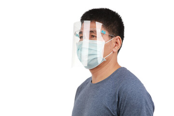 Potrait side view of a man wearing faceshield and facemask , now normal coronavirus protection on...