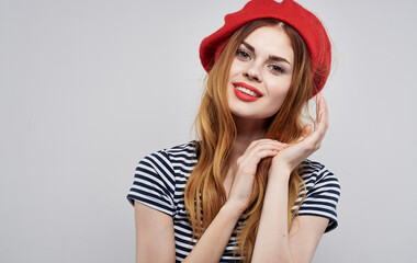cheerful woman wearing a red hat makeup France Europe fashion posing summer