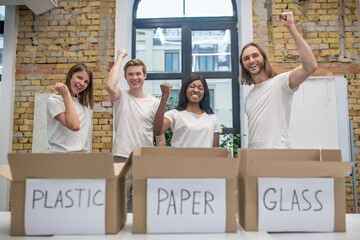 A team of eco volunteers at work looking confident