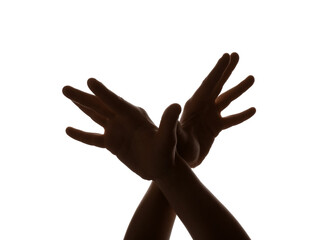 Child performing a shadow play on white background