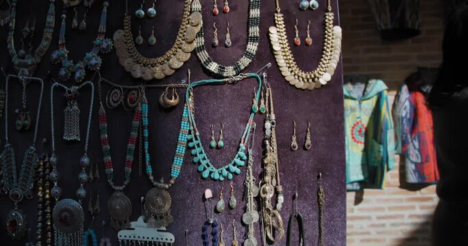 String jewelry is sold in Bukhara, Uzbekistan. Silver and gold
