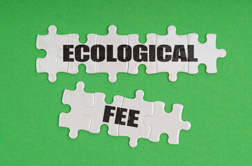 On a green background, there are puzzles on which it is written - ecological fee