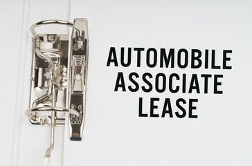 In the folder under a paper clip there is a white sheet with the inscription - Automobile Associate lease