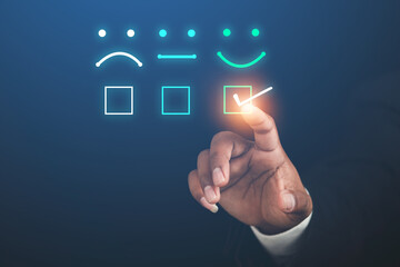 Customer Satisfaction Concept Businessman touching virtual screen on smiley face icon
