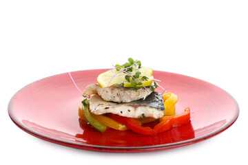 Plate of tasty sea bass fish with vegetables on white background