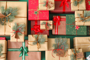 Different Christmas presents on color background