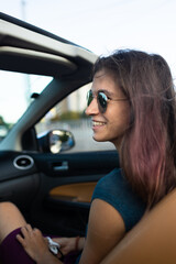 Fototapeta na wymiar portrait of a girl in a car