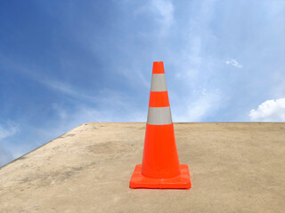 orange traffic cone on the road